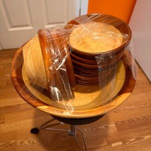 Barely used brown and tan wooden salad bowl w/matching serving bowls.